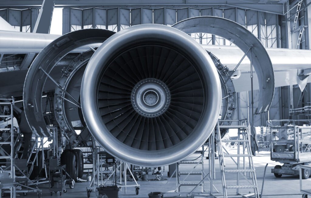 Opened aircraft engine in the hangar
